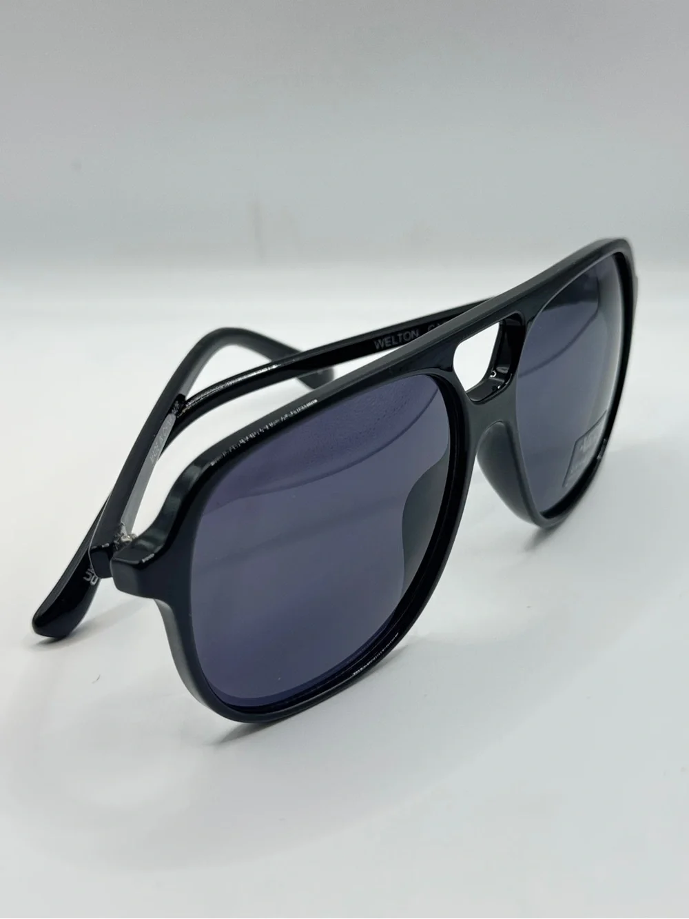 Vans Glossy Black Sunglasses with Blue-Tinted Lenses